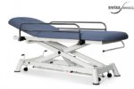 Table de soins médicaux avec barrières de sécurité à plat