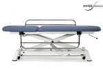Table de soins médicaux avec barrières de sécurité baissée