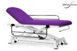 Table de soins médicaux avec barrières de sécurité baissée